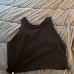 A black athleta small crop top with a built in bra